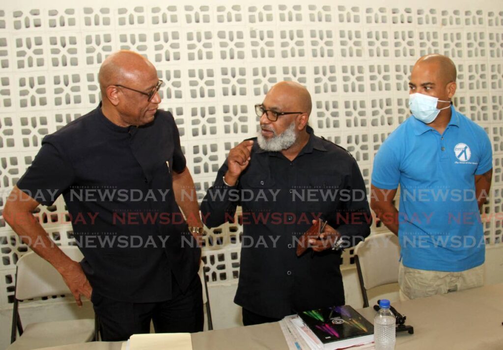 Joint Trade Union Movement (JTUM) president  Ancel Roget, JTUM secretary Ozzi Warwick, and trustee of the Aviation Communication & Allied Workers’ Union Rudi Atwell speak during the JTUM media conference at the CWU Hall, Henry Street, Port of Spain.  Photo by Ayanna Kinsale