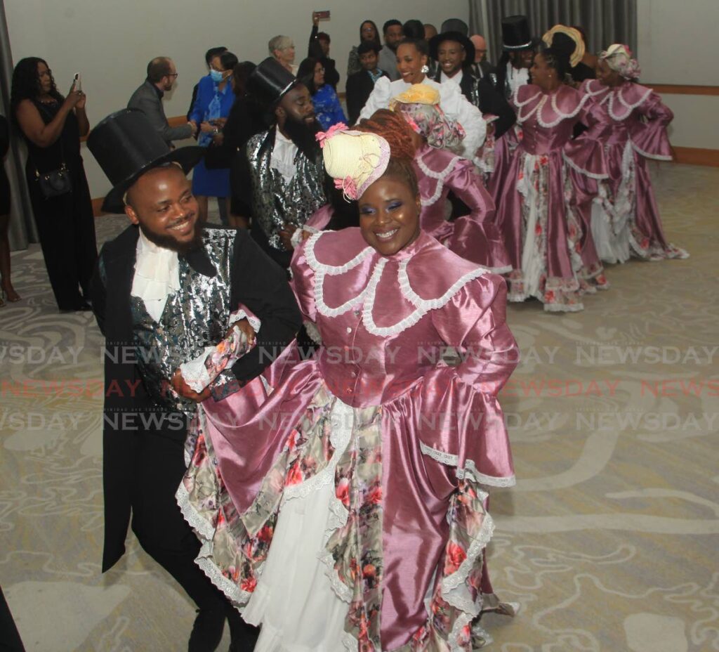 Performers re-enact an old-time Tobago wedding at the Caribbean Investment Forum reception, Hyatt Regency, Port of Spain on Tuesday. - ANGELO MARCELLE
