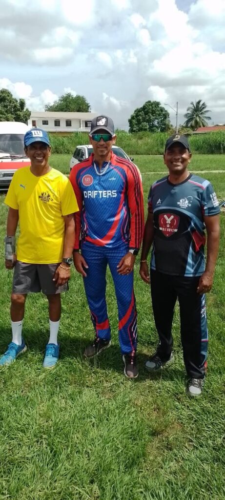 Norman Mungroo, left, of the Naorman's Windball 12-Over Cricket League alongside national cricketer Rayad Emrit, middle, and former Moosai cricketer Sunil Bachew. Emrit is a player in the league. - 