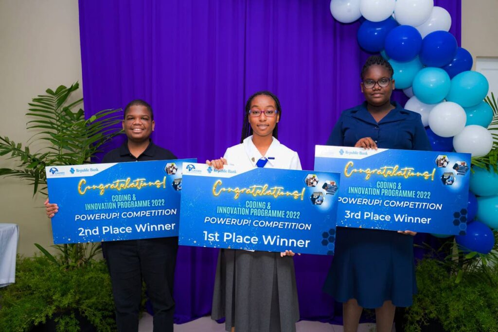 Lloyander Scotland, right, placed third in Cariri and Republic Bank’s Coding and Innovation Programme’s Power Up! competition. Also in photo are first-place winner Joseann Boneo, centre, and second-place winner Lionel Clement.  - Photo courtesy Ministry of Planning and Development
