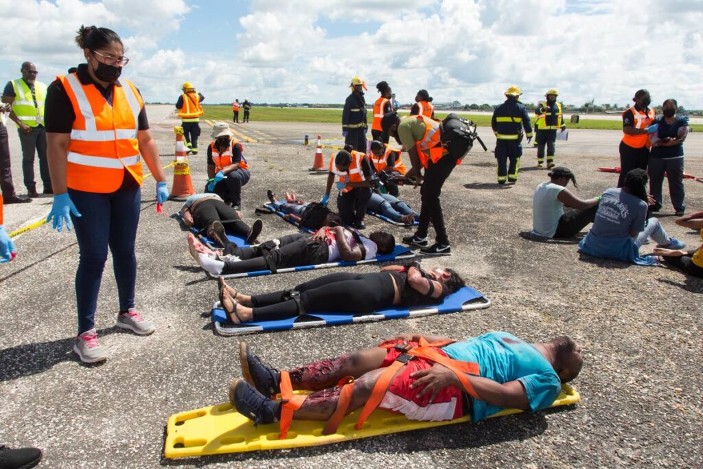 A scene from the full-scale emergency drill held at the Piarco international airport on Friday. - PHOTO COURTESY THE AIRPORTS AUTHORITY