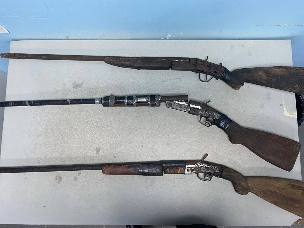Three home-made guns seized by police in Manzanilla on Friday.  - Photo courtesy TTPS