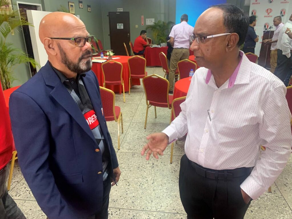 TTCB treasurer Kiswah Chaitoo, left, chats with cricket manager Omar Khan at Monday’s Dream XI T10 Blast player draft held at the National Cricket Centre, Couva.   - Courtesy TTCB