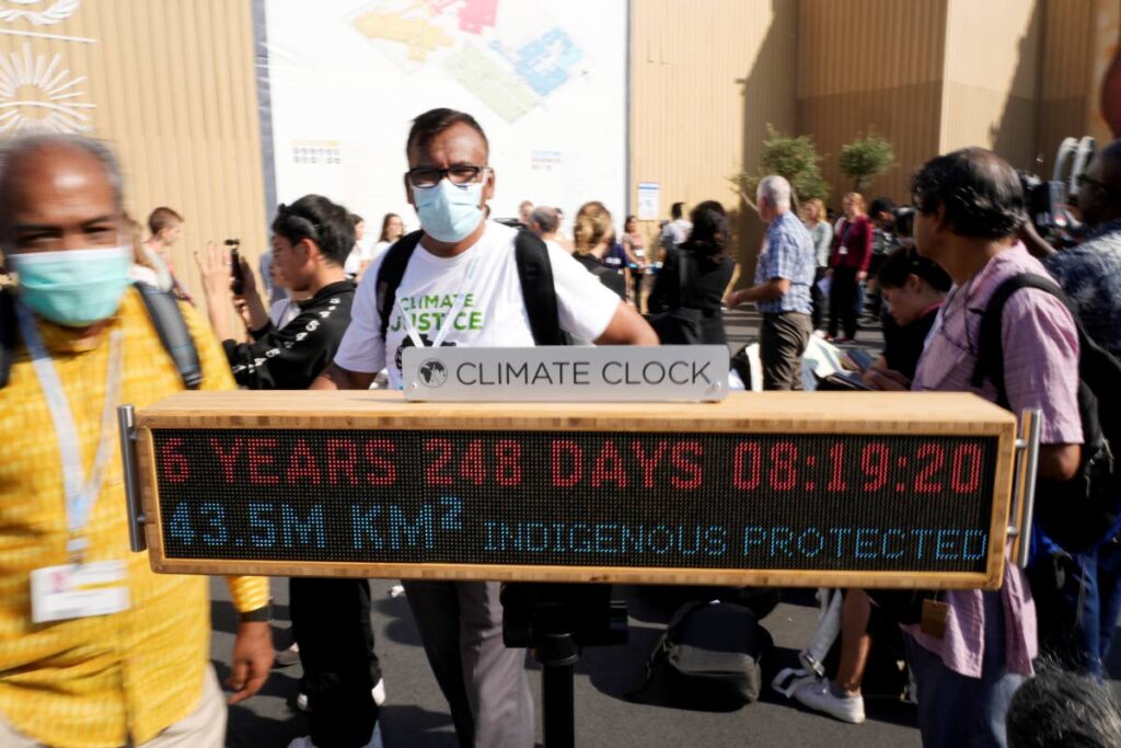 A climate clock displays how much time is left before the world uses up the carbon emissions that can still be produced while staying at or below the 1.5 degrees warming goal at a demonstration during the COP27 UN Climate Summit, Wednesday, in Sharm el-Sheikh, Egypt. AP Photo - 
