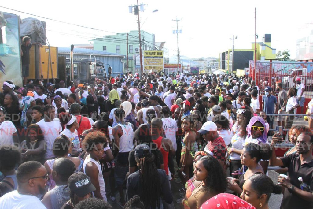 Thousands jam pack the streets for J'Ouvert in San Fernando on Saturday. - PHOTO BY MARVIN HAMILTON