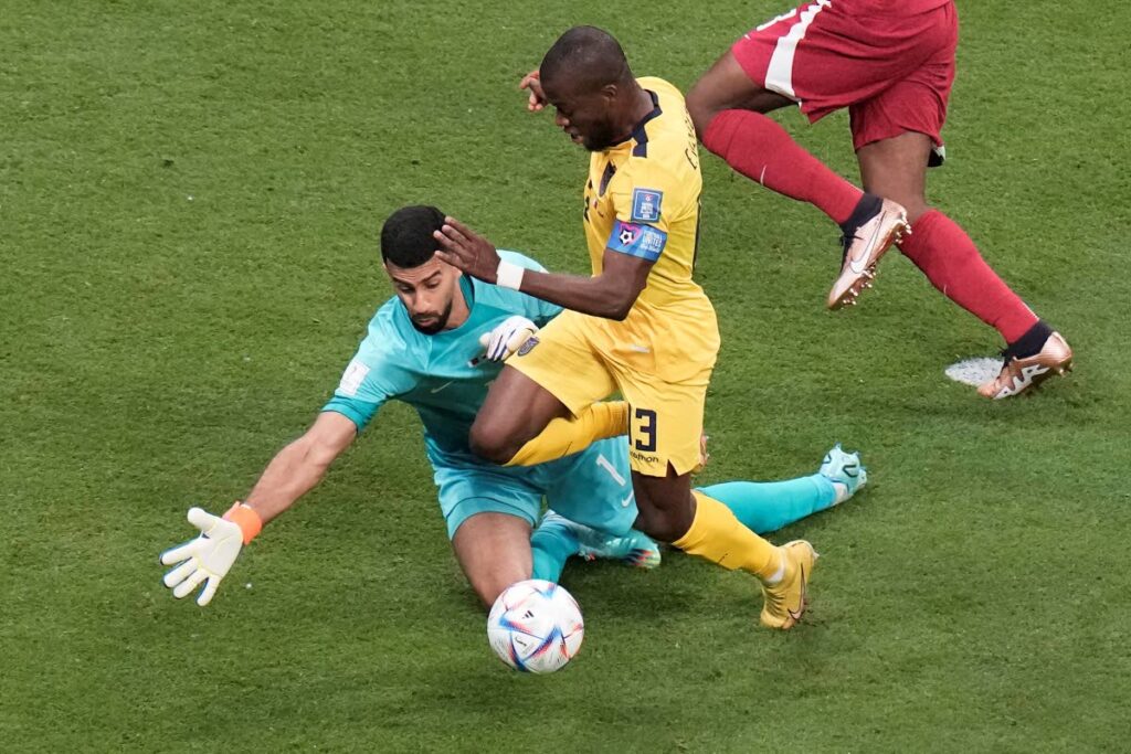 Ecuador's Enner Valencia is fouled by Qatar's goalkeeper Saad Al Sheeb, during the World Cup group A match at the Al Bayt Stadium in Al Khor, Qatar, Sunday. - AP