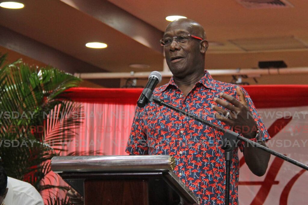 Prime Minister Dr Keith Rowley delivers the feature address at the PNM's National Womens League's 48th annual conference at Achievors Banquet Hall, San Fernando on Sunday. - Photo by Marvin Hamilton