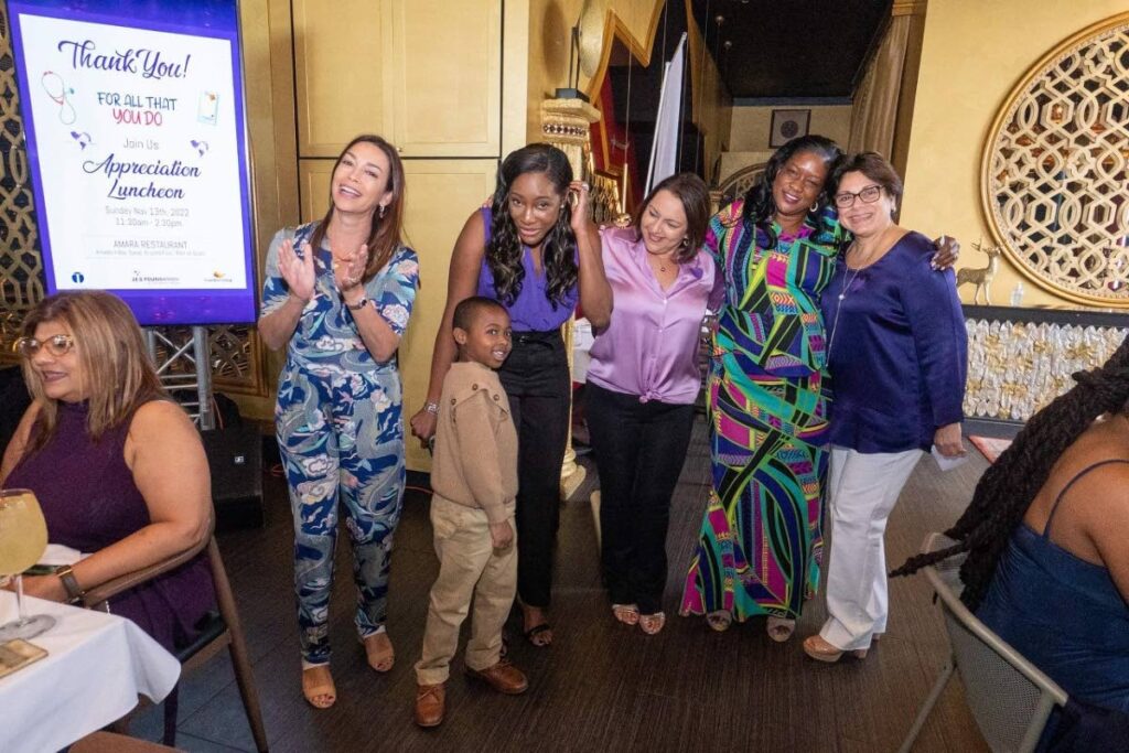 Natalie Sabga, head of the John E Sabga Foundation, is flanked by nurses and other guests during a appreciation luncheon hosted by the foundation, during Pancreatic Cancer Awareness Month.  - 