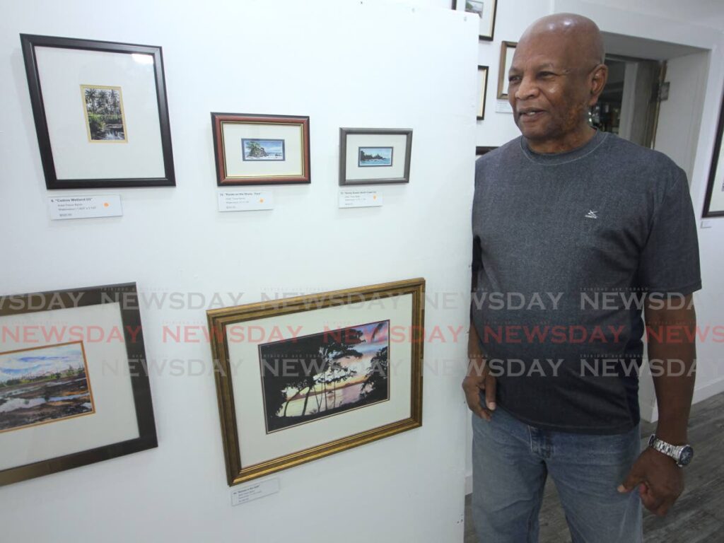 Trevor Byron shares the history of his paintings during his exhibition at Arnim's Galleria, La Romaine - ANGELO MARCELLE