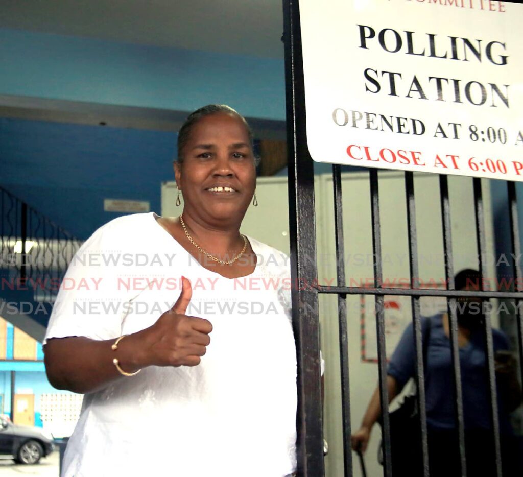 Irene Hinds, who is vying for the post of PNM operations officer, signals her confidence at Diego Martin Central Community Centre on Saturday. - SUREASH CHOLAI