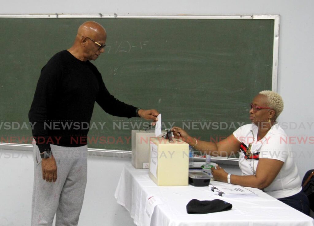 San Fernando mayor Junia Regrello places his ballot in a box at the Pleasantville Secondary School, Pleasantville during early voting for the PNM's internal election. Photo by Ayanna Kinsale