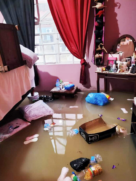 FLOODED OUT: This photo posted to social media on Wednesday, shows floodwaters inside a house in Railway Road, Sangre Grande. 