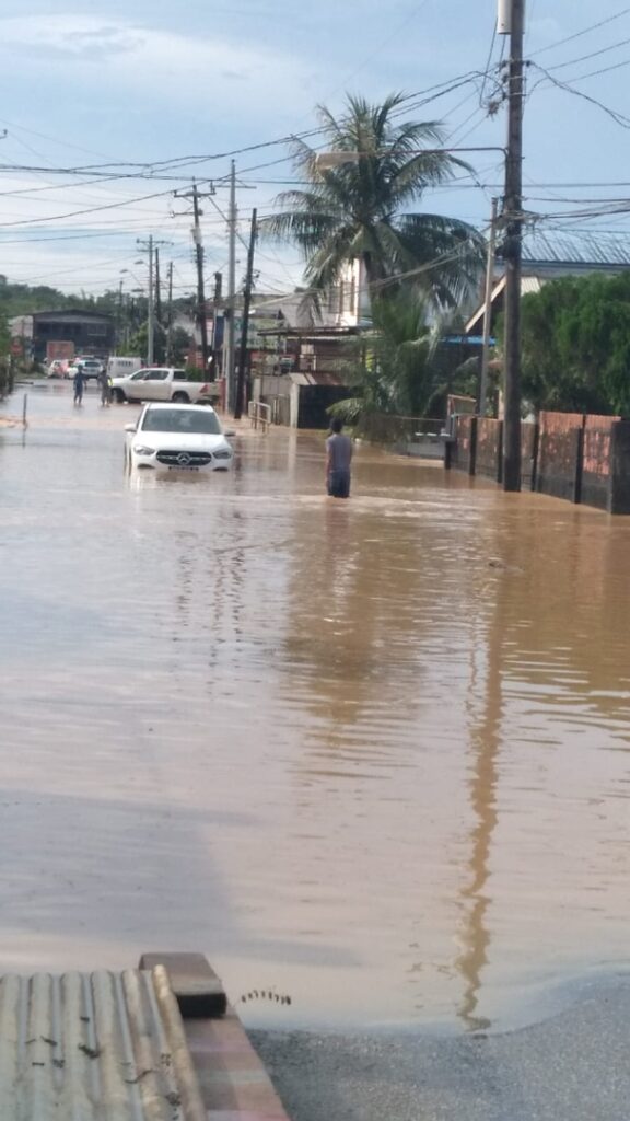 Mercedes Benz stalls while driving through flood on Picton Road, Sangre Grande. 