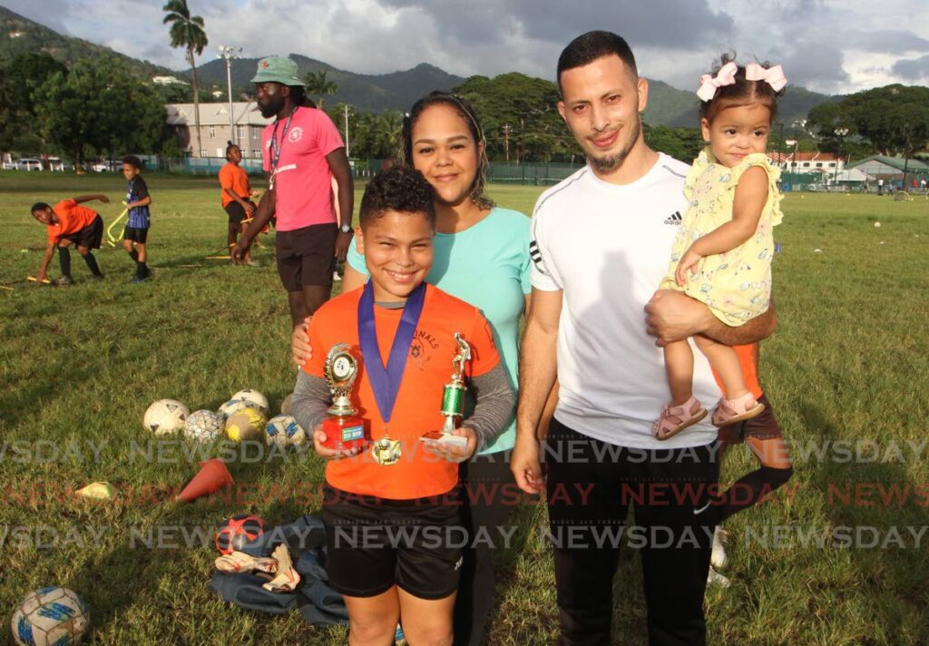 Dylan Santiago Suarez and his mother Milagros, father Navor and sister Aidana at Nelson Mandela Park where Dylan trains with Cardinals Football Academy. - ANGELO MARCELLE