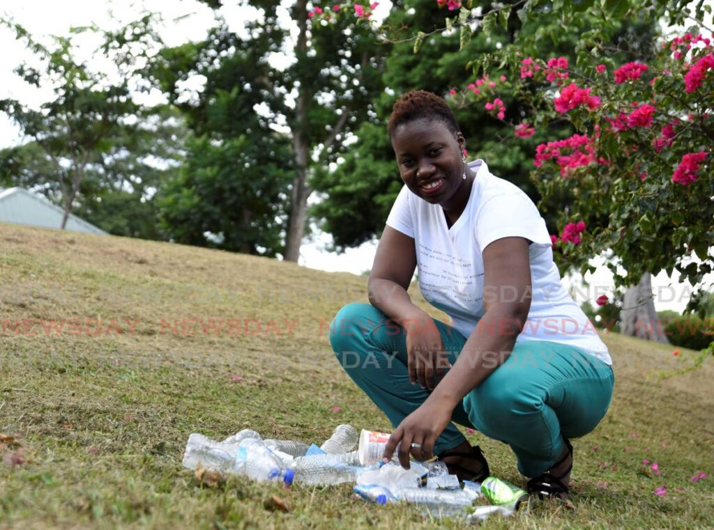 Sian Cuffy-Young sorts plastic and canned bottles at the Botanical Gardens, Port of Spain in November 2020. - FILE PHOTO/AYANNA KINSALE