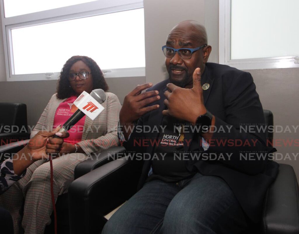 NCRHA CEO Davlin Thomas addresses the media during the launch of cervical cancer campaign at Mt Hope Women's Hospital on Saturday. At left is Nursing Services general manager Dianne Hineah. Photo by Angelo Marcelle