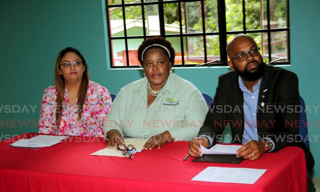 Digicel Foundation Director Bibi Mohamed from left, Carlene  Nicholas Holder President of the Paramin Development Committee and Port of Spain West Rotary Club President Gregory Bourne at the launch of the Paramin Community Connect project , at the Paramin Development Community Centre. Photo by Sureash Cholai