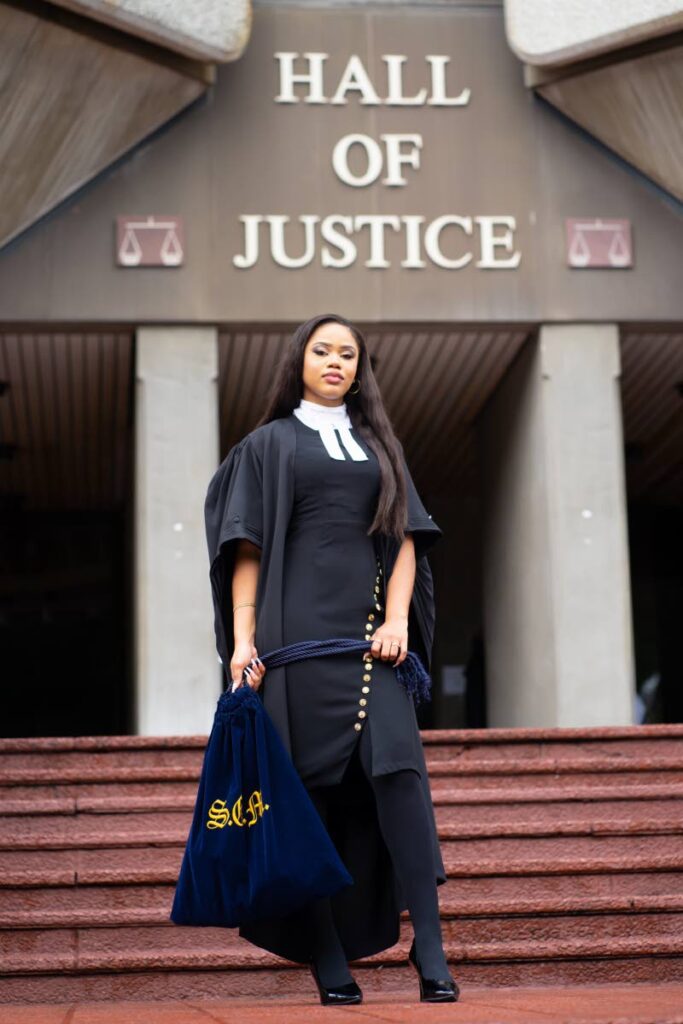 Sasha-Ann Moses in front of the Hall of Justice, Port of Spain, after she passed the bar on November 11, 2022. Photo courtesy Sasha-Ann Moses. - 