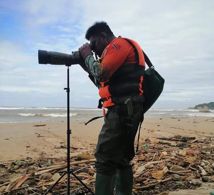 COASTAL SEARCH: A member of the Hunters Search and Rescue Team is seen in this photo posted to the team's Facebook page, searching the sea near the mouth of the Ortoire River on Sunday for missing three-year-old Allon Ramdial.  - 