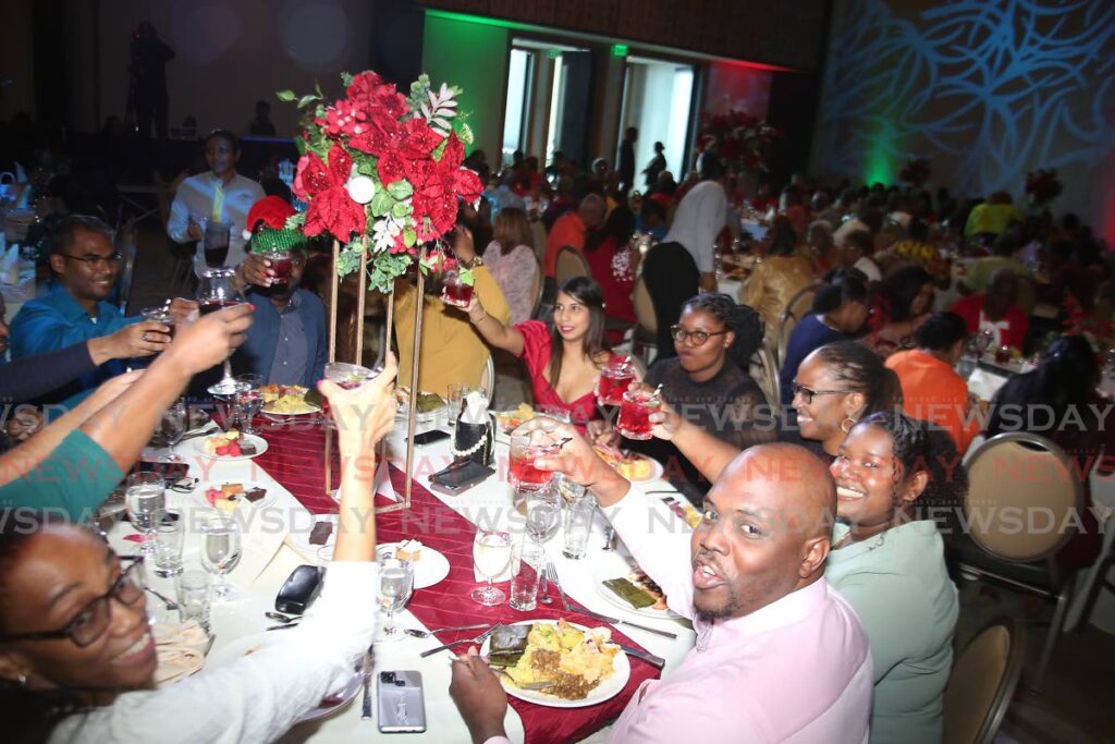 The Trinidad and Tobago International Financial Centre (TTIFC) group at Hyatt Regency Trinidad Biggest Little Christmas Party. - SUREASH CHOLAI