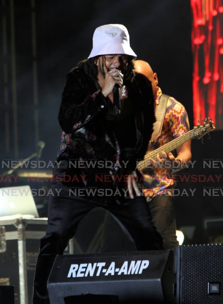 Kes the Band performs at Burna Boy's concert at O2 Park, Chaguaramas, on December 17. Photo by Angelo Marcelle