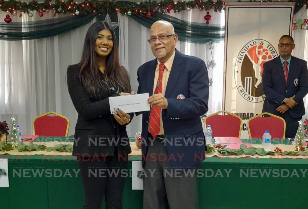 Namalco Construction Services Limited director Alisha Ali presents TTCB president Azim Bassarath with a cheque for TT$120k as title sponsors for the Namalco U23 Cup at the National Cricket Centre, Couva, on Tuesday. Photo by Jonathan Ramnanansingh