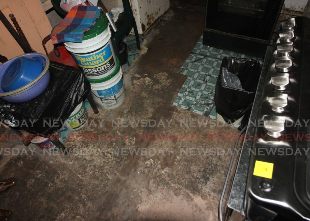 Appliances are rusted and wooden cupboards have begun to rot at the 13th Street, Beetham Gardens home of Renee John thanks to a nearby leaking WASA pipe.