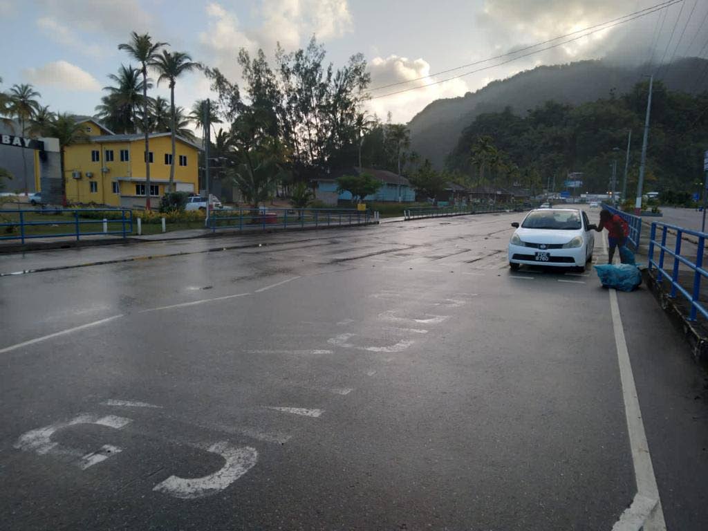 The North Coast Road adjacent to Maracas Bay after being cleared following flooding, which resulted from the rough seas over the weekend.  - 