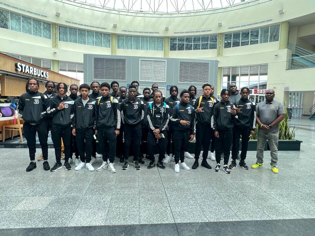 St Benedict's U16 team at Piarco International Airport before they left for Guyana for the KFC Goodwill U18 Cup.  - 