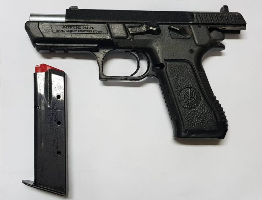 A IMI Jericho pistol and ammunition were seized by police in Bon Air Gardens. 


PHOTO COURTESY TTPS - PHOTO COURTESY TTPS