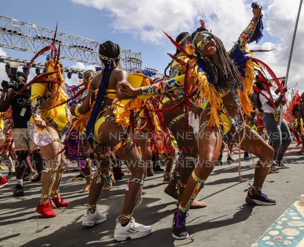 Masqueraders from the band Paparazzi with their presentation Hidden-Masters of Disguise at the Queen's Park Savannah, Port of Spain on February 25, 2020. - 