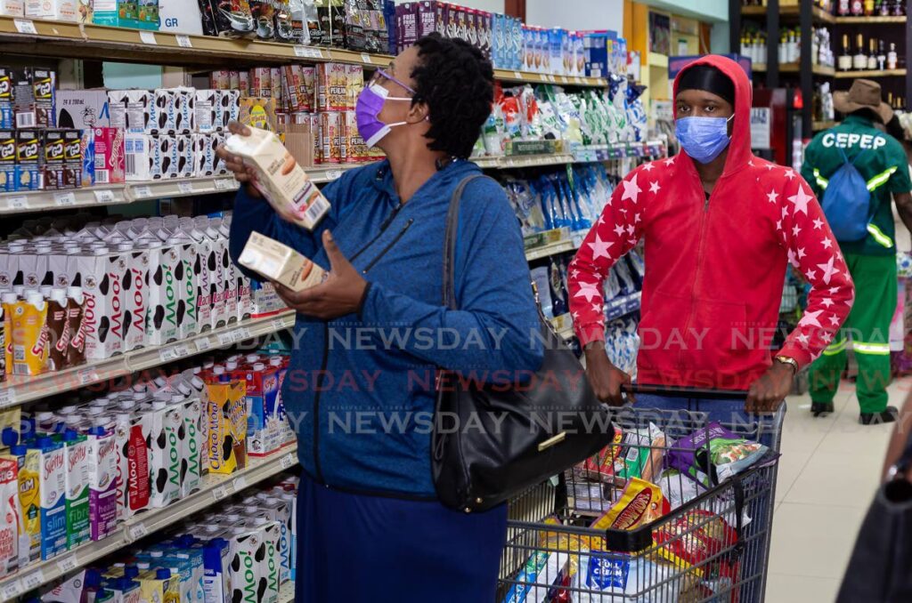 File photo: People shop at a supermarket in Tobago. 