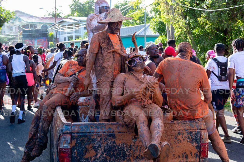 Mud masqueraders at Plymouth J'Ouvert celebrations last year. FILE PHOTO - 