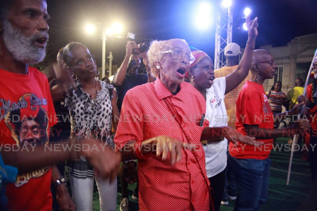 LOVE: Patsy Calliste, centre, among the crowd who turned up on Tuesday night at a concert on Harris Promenade, San Fernando in honour of her late husband, calypso icon Leroy 