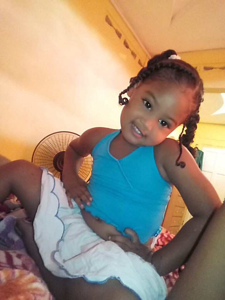 Kylie Maloney age 6  was killed when gunmen open fire on a house on Blake Avenue in Sangre Grande, several others including her mom was injured .