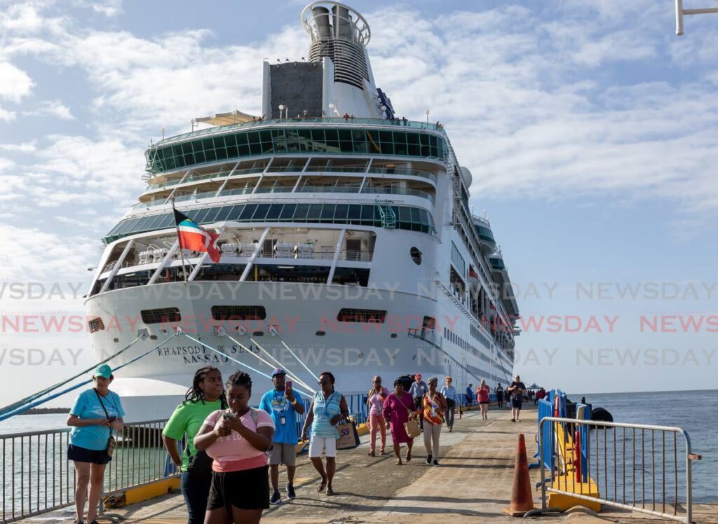 Passengers disembark the Rhapsody of the Seas on Tuesday at the Port of Scarborough.  Photo by David Reid