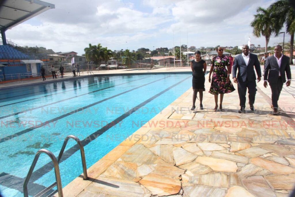 From left, Councillor for Tarouba, Theresa Lynch, chairman of the San Fernando East constituency Patricia Alexis, MP for San Fernando East Brian Manning and Councillor for Cocoyea Nigel Couttier tour the  Cocoyea Community Swimming Pool which is now open to the public on Thornhill Street, San Fernando, on Wednesday. - Lincoln Holder