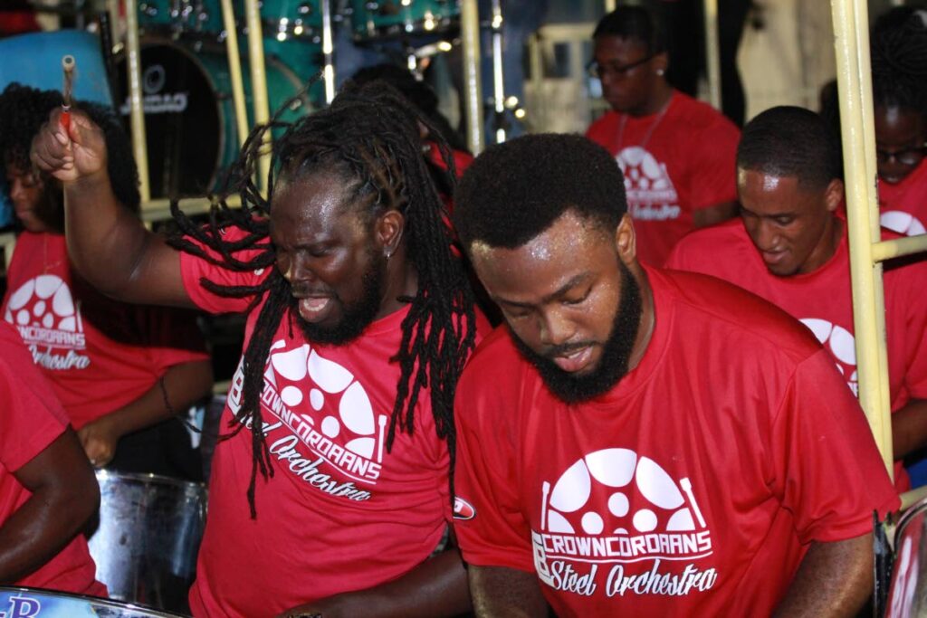 C&B Crown Point Cordaans players enjoy their performance at last Saturday's Panorama small conventional band semis at Victoria Square, Port of Spain.  - Jimmel Daniel/Pan Trinbago