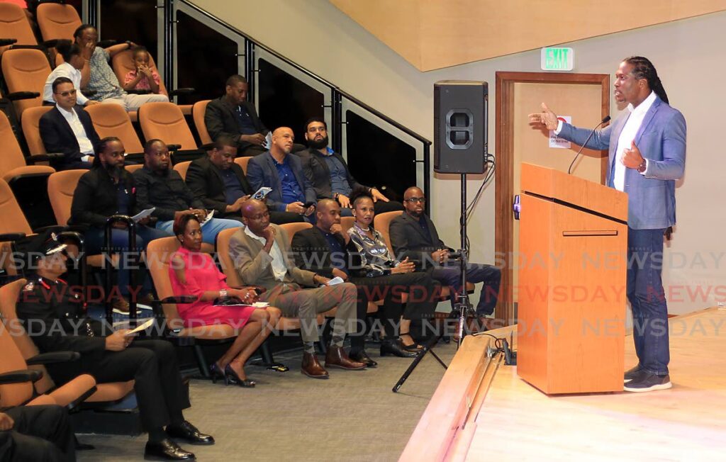MENTORING: Laventille East/Morvant MP Adrian Leonce speaks at the Massy Motors ACL Morvant Men's Mentorship Movement graduation ceremony on Sunday at the Government Plaza Auditorium in Port of Spain. PHOTO BY ROGER JACOB - 