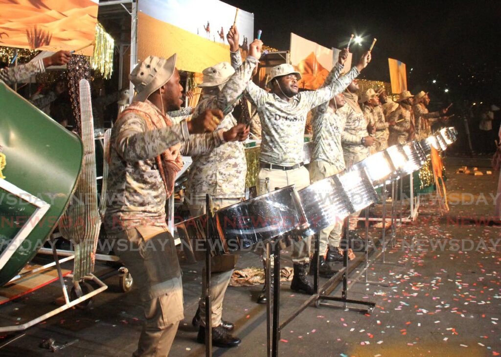 Members of the  Defence Force Steel Orchestra perform Raising Dust by Johnny Douglas. - Photo by Ayanna Kinsale
