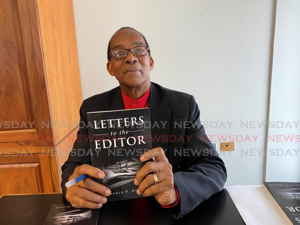 Terrence Honore holds a copy of his book, Letters to the Editor. - Narissa Fraser