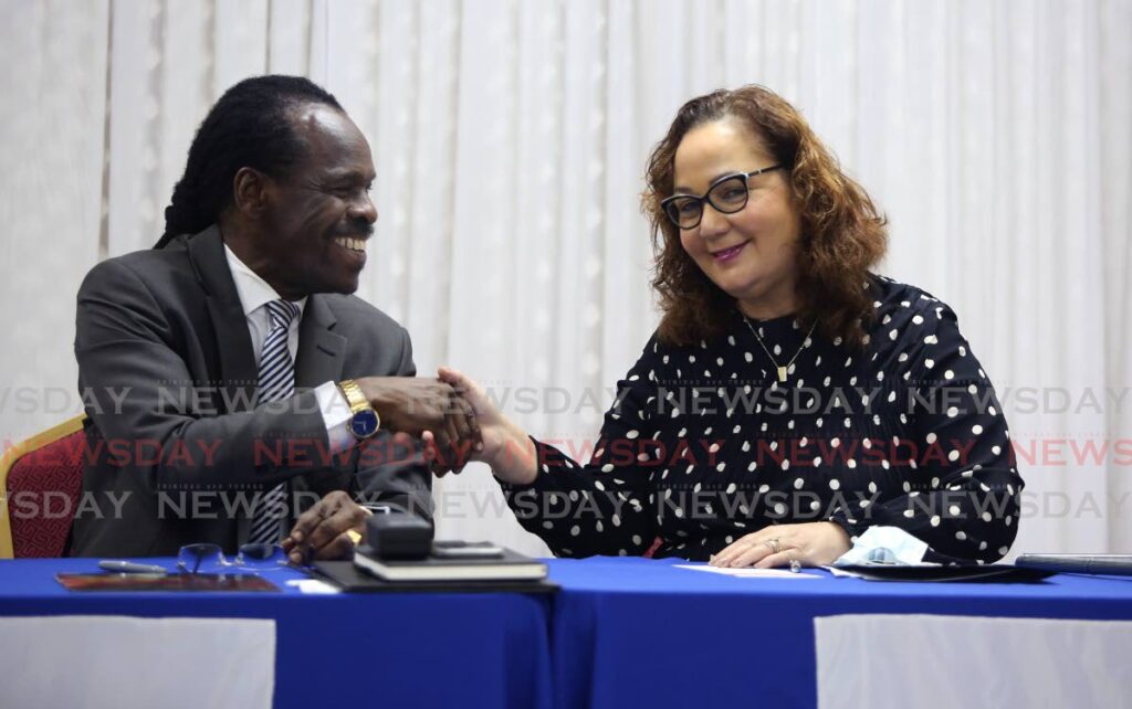 Ministry of National Security Fitzgerald Hinds and UWI's Pro Vice-Chancellor and Principal Professor Rose-Marie Belle Antoine at an MOU signing at the ministry, Abercromby Steet, Port of Spain. - SUREASH CHOLAI