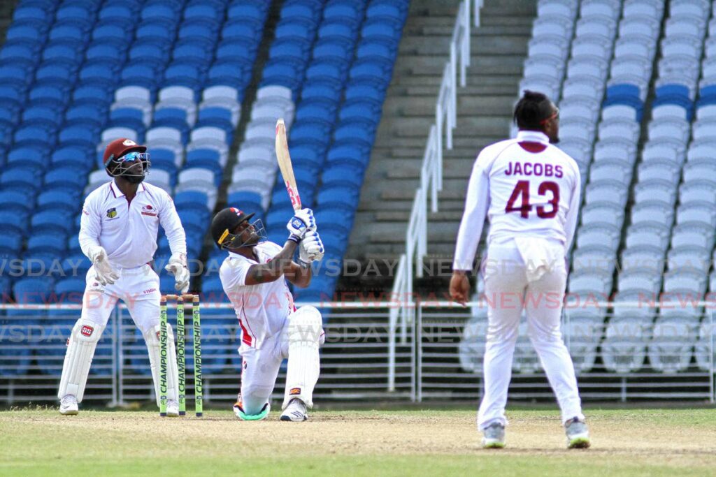 In this Jan 1, 2020 file photo, TT Red Force batsman Terrance Hinds looks up as his shot goes for six during the West Indies Four-Day Championships match against the Leeward Islands Hurricanes, at the Brian Lara Cricket Academy, Tarouba. Hinds made 102 not out.  - Marvin Hamilton