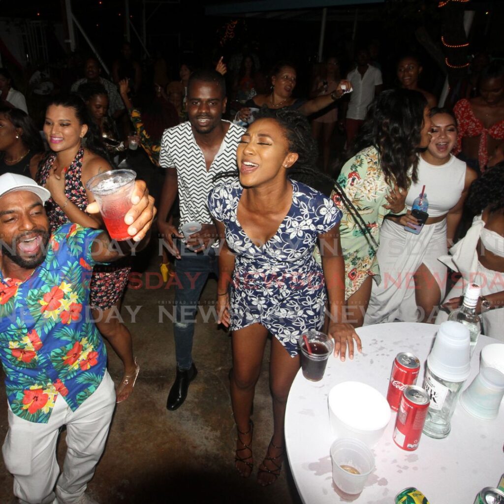 Party-goers enjoy the music during  Roasted, at Rock Back, Chaguaramas, on May 1, 2022. The event was created by brothers Andreas and Myles Yorke.