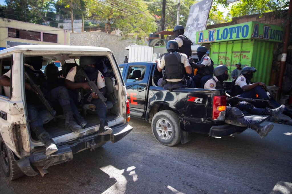 FILE PHOTO: Police patrol after recovering the bodies of slain journalists in Port-au-Prince, Haiti, on January 7, 2022. AP PHOTO - 