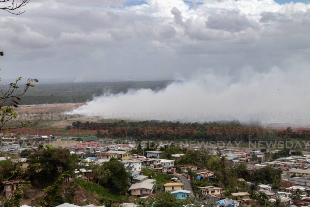 Thick smoke billows from the Beetham landfill on the outskirts of Port of Spain on April 4, 2022. PHOTO BY JEFF K MAYERS 