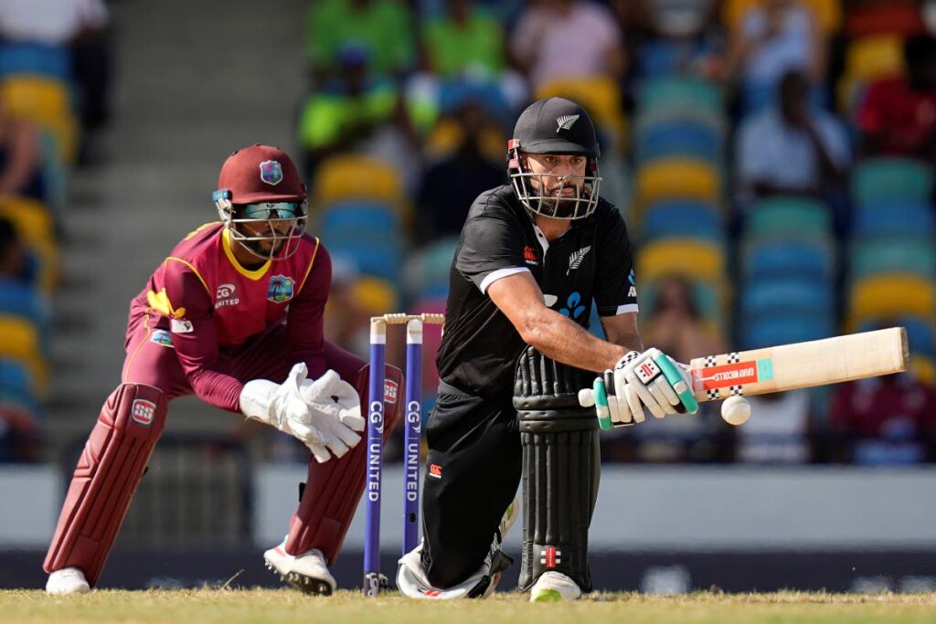 In this August 19, 2022 file photo, New Zealand's Daryl Mitchell plays a shot under the look of West Indies' wicketkeeper Shai Hope during the second ODI at Kensington Oval in Bridgetown, Barbados. On Wednesday, Cricket West Indies named Hope as the new West Indies ODI captain. (AP Photo) 