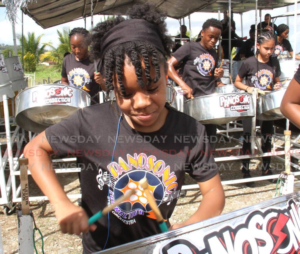 Members of Panosonic Connection Steel Orchestra perform during the National Junior Panorama prelims at Macoon Street, Victoria Village, San Fernando, on January 16. - Ayanna Kinsale