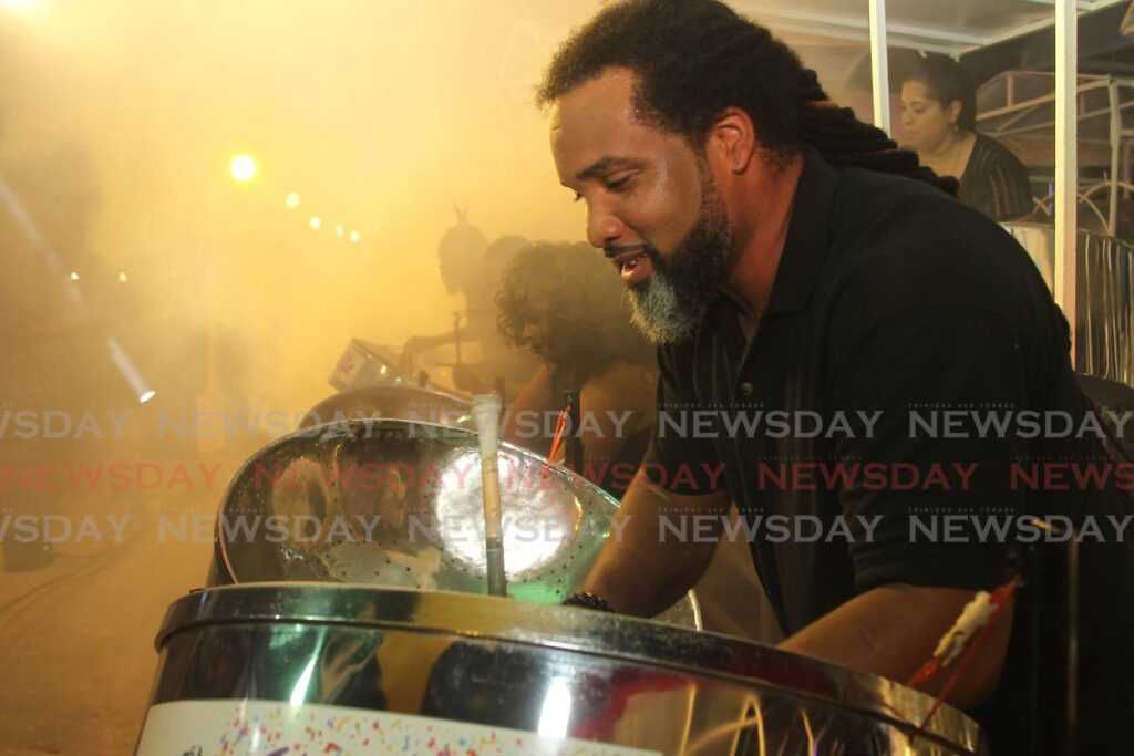 A Skiffle Steel Orchestra player during the band's performance at its panyard on January 30. - Photo by Marvin Hamilton