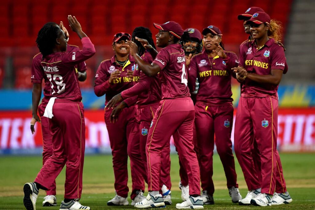 THROWBACK: In this March 1, 202 file photo, West Indies’ players celebrate the dismissal of England’s Heather Knight during the Twenty20 women’s World Cup match in Sydney. - (AFP PHOTO)